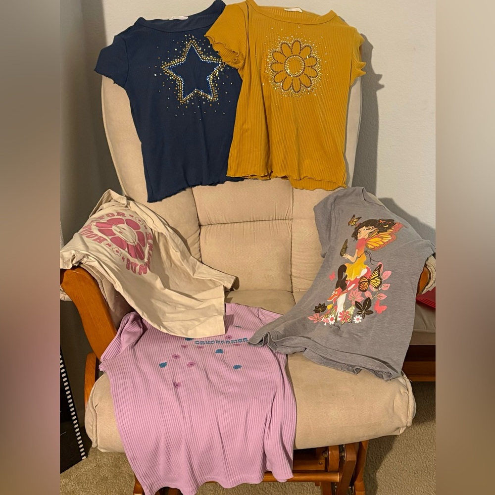 Girls bundle of shirts, size Large. All used but in great condition!